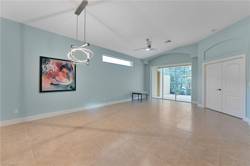 15322 Cortona Way Naples, FL 34120 - Photo 2 of 26 a view of an empty room with a window