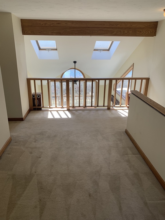 5 B Pond View Way, Unit 5B Northborough, MA 01532 - Photo 11 of 16 a view of an empty room with staircase