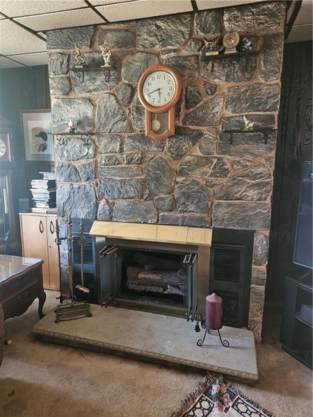 643 Joffre Bulger Road Bulger, PA 15019 - Photo 13 of 22 a fireplace with a clock on top of it