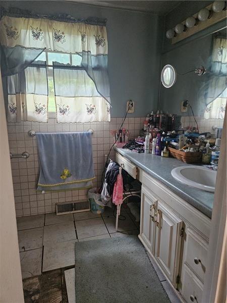 643 Joffre Bulger Road Bulger, PA 15019 - Photo 14 of 22 a room with lots of clutter and furniture