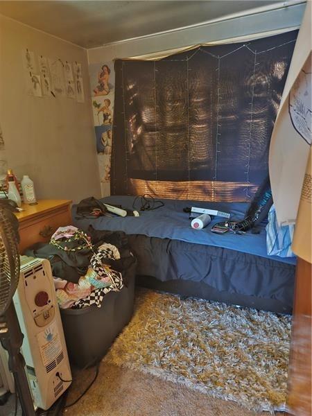 643 Joffre Bulger Road Bulger, PA 15019 - Photo 19 of 22 a bedroom with a bed and a dresser