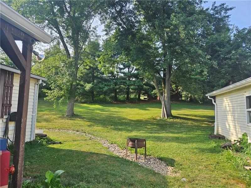 643 Joffre Bulger Road Bulger, PA 15019 - Photo 6 of 22 a view of a house with a big yard potted plants and large tree