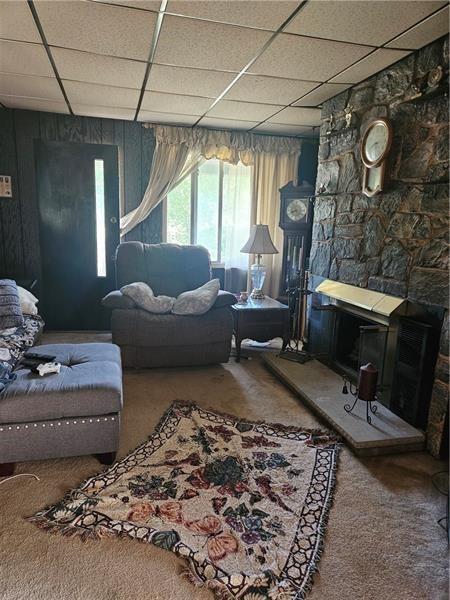 643 Joffre Bulger Road Bulger, PA 15019 - Photo 9 of 22 a living room with furniture and a fireplace