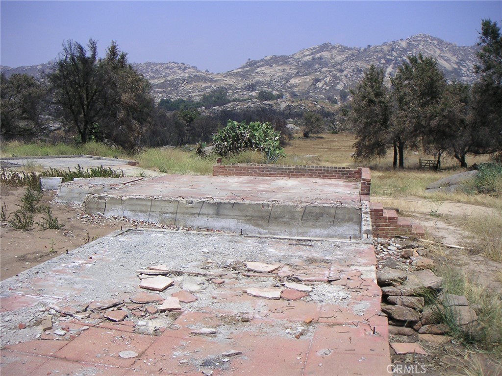 14469 Mussey Grade Road Ramona, CA 92065 - Photo 2 of 6 a view of a yard with a tree