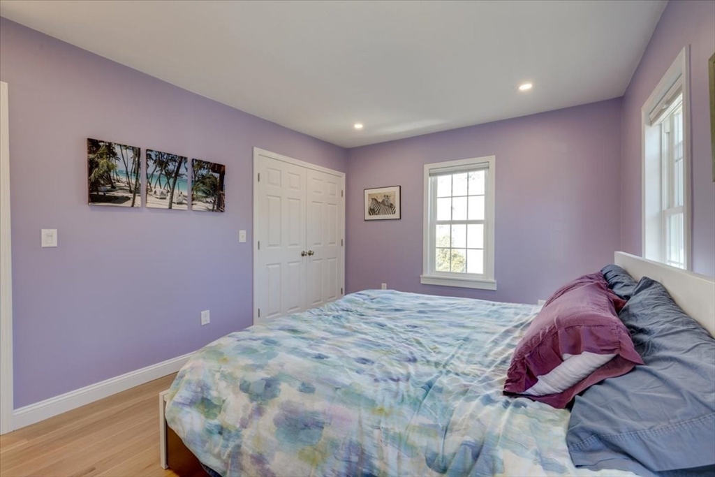 1 Bennett Street Natick, MA 01760 - Photo 12 of 28 a bedroom with a bed and a window