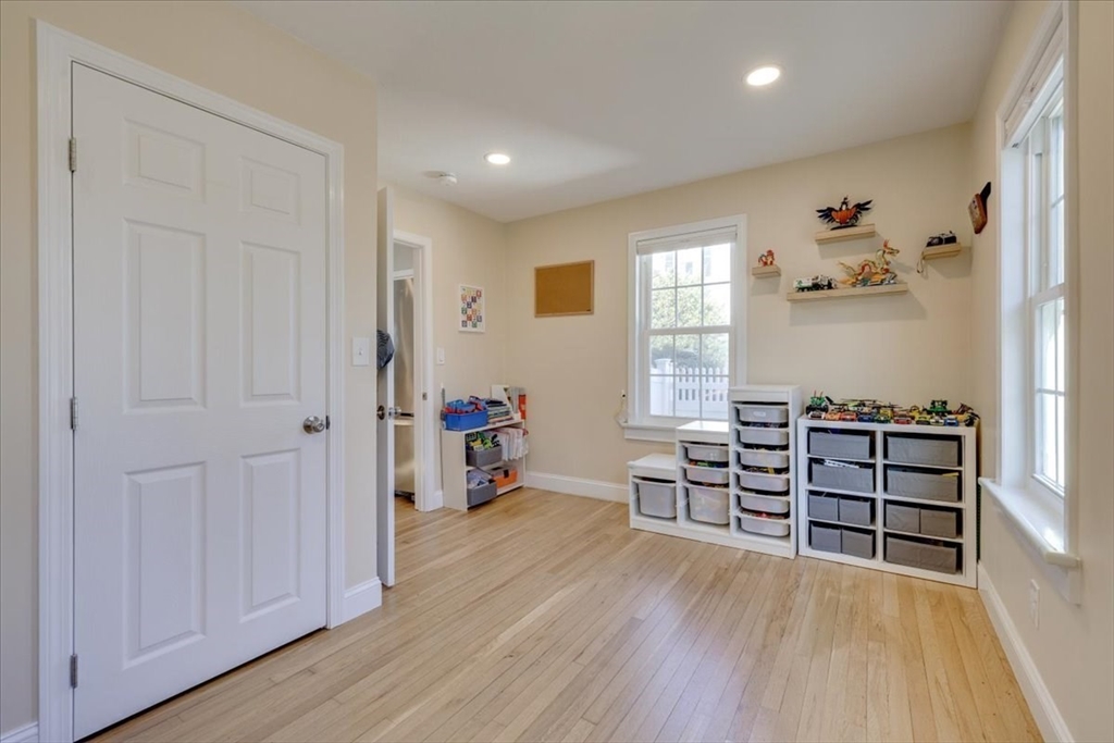 1 Bennett Street Natick, MA 01760 - Photo 18 of 28 wooden floor in an empty room and a window