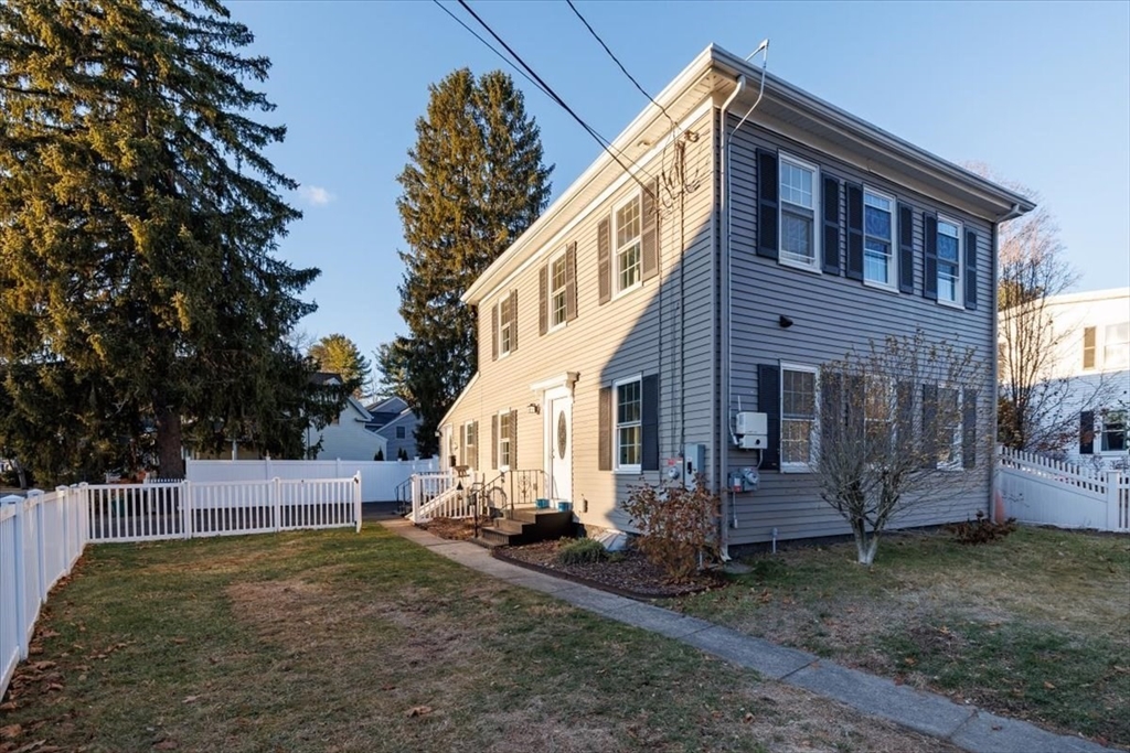 1 Bennett Street Natick, MA 01760 - Photo 22 of 28 a front view of house with yard
