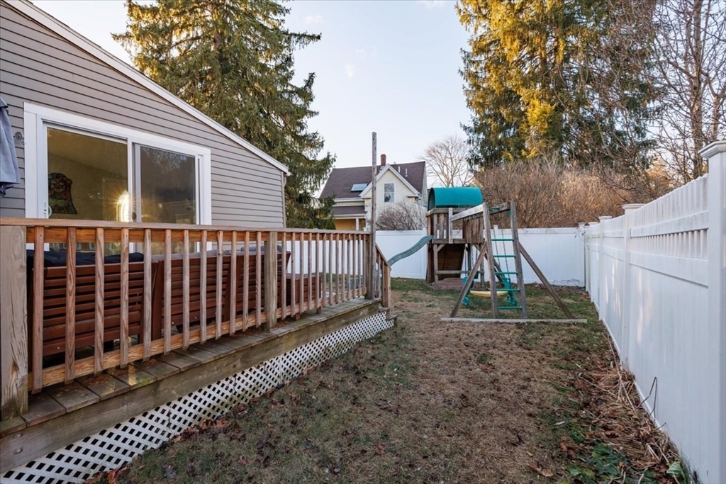 1 Bennett Street Natick, MA 01760 - Photo 24 of 28 a view of a house with a yard