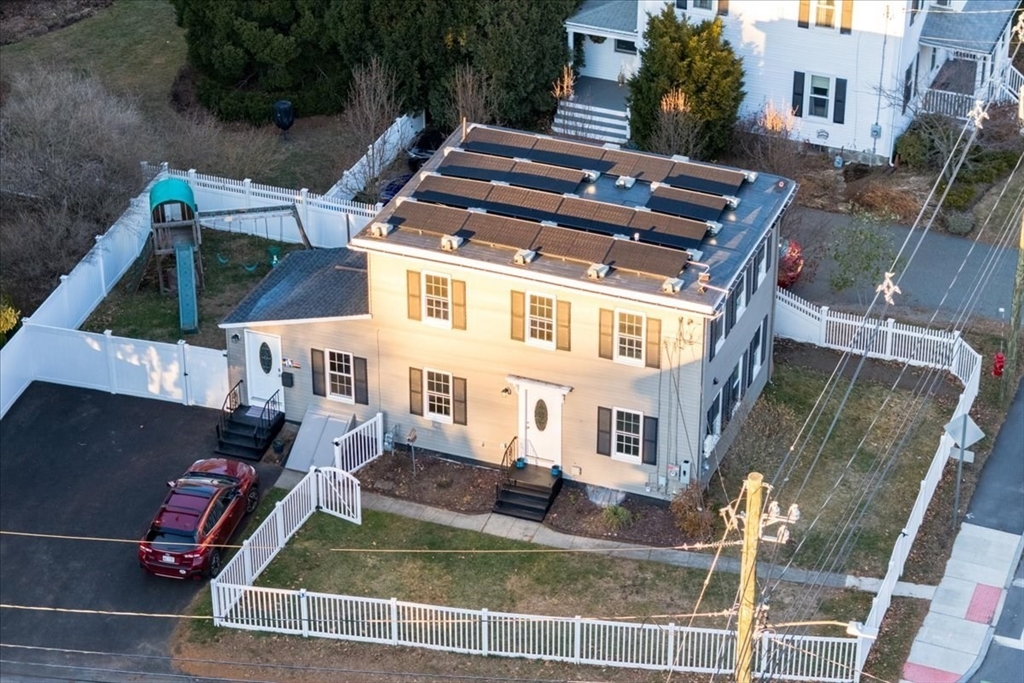 1 Bennett Street Natick, MA 01760 - Photo 25 of 28 a view of a house with backyard