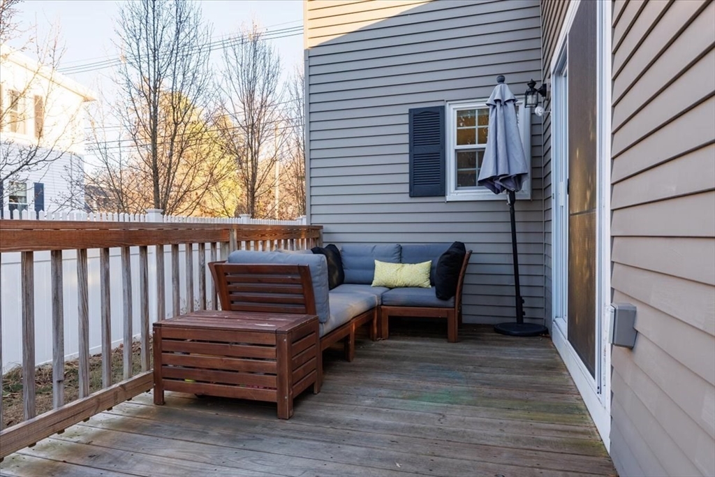 1 Bennett Street Natick, MA 01760 - Photo 27 of 28 a view of a wooden bench sitting on the wooden floor