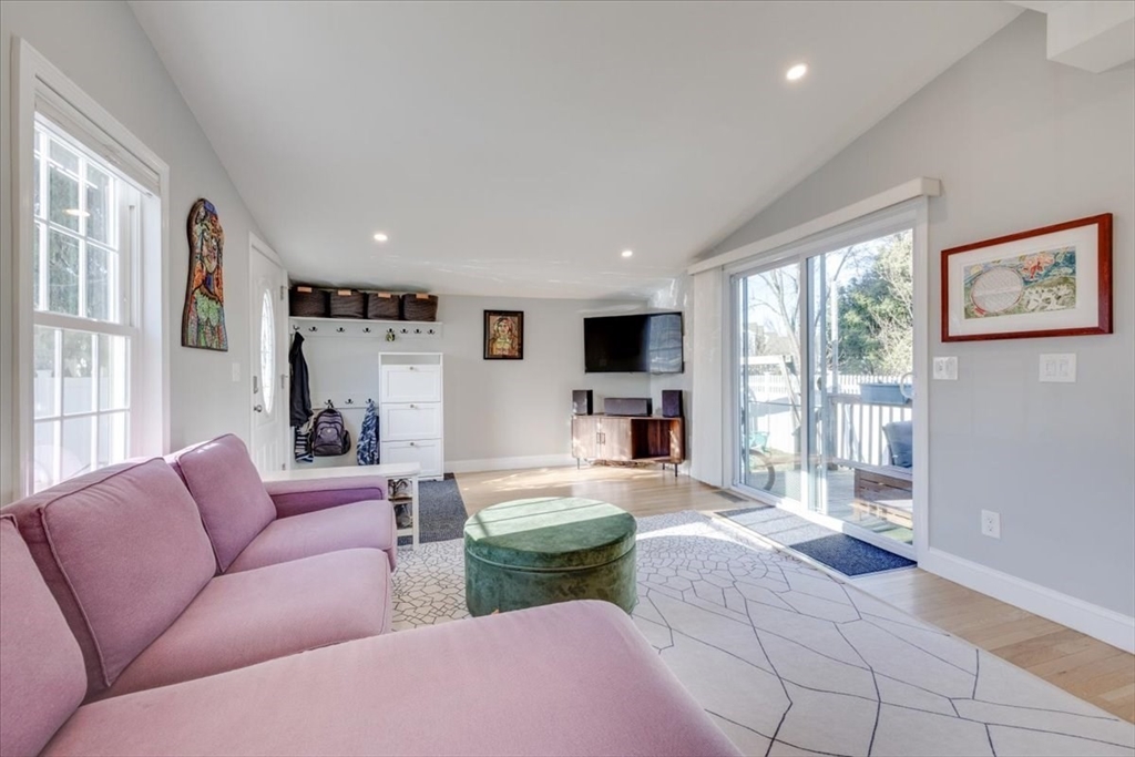 1 Bennett Street Natick, MA 01760 - Photo 4 of 28 a living room with furniture and a flat screen tv