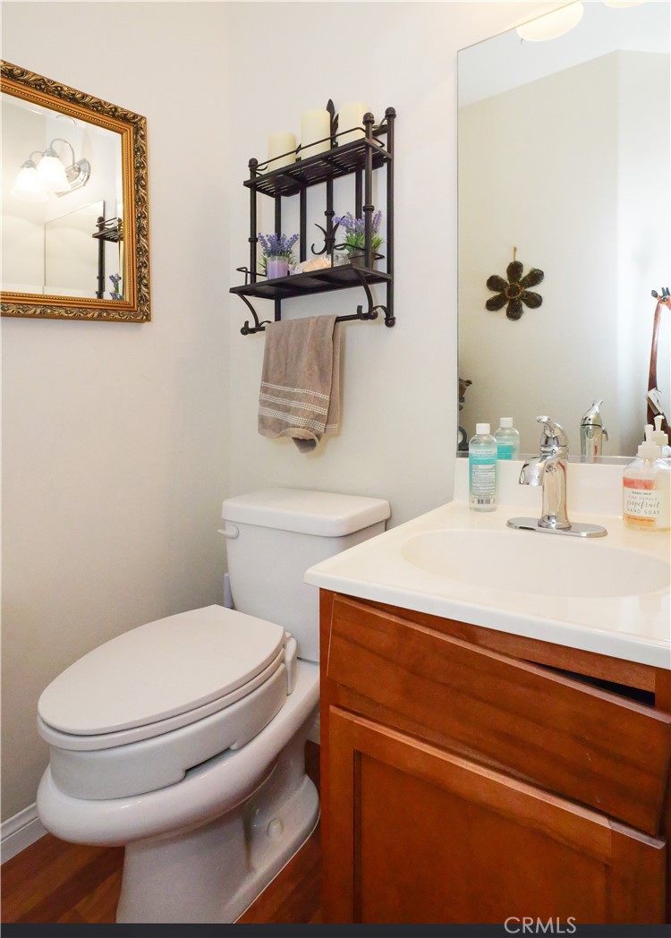 1323 Post Avenue, Unit K Torrance, CA 90501 - Photo 18 of 23 a bathroom with a toilet and a sink