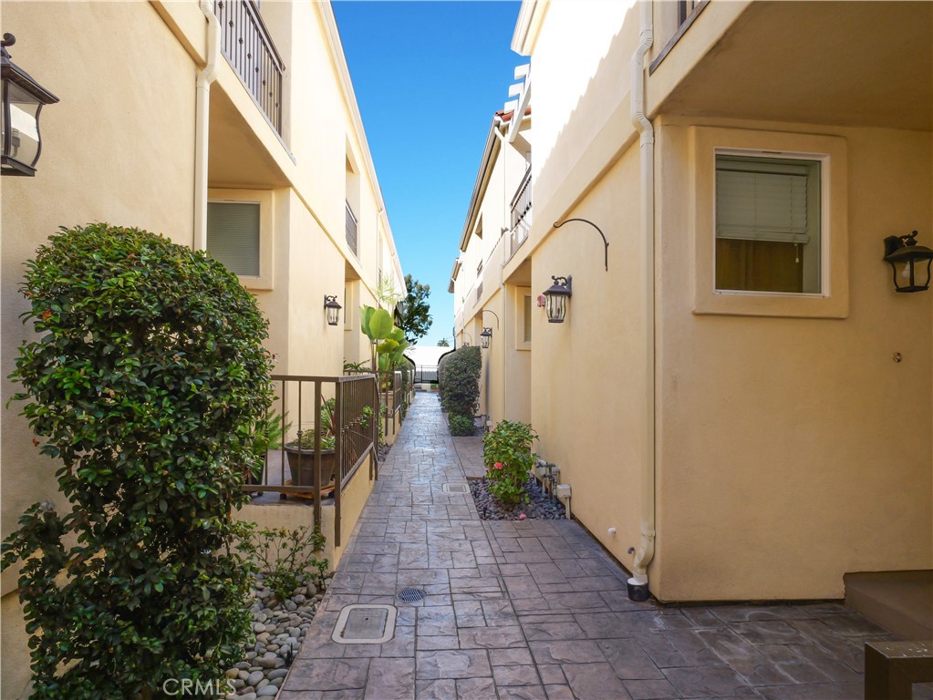 1323 Post Avenue, Unit K Torrance, CA 90501 - Photo 19 of 23 a view of the house with potted plants