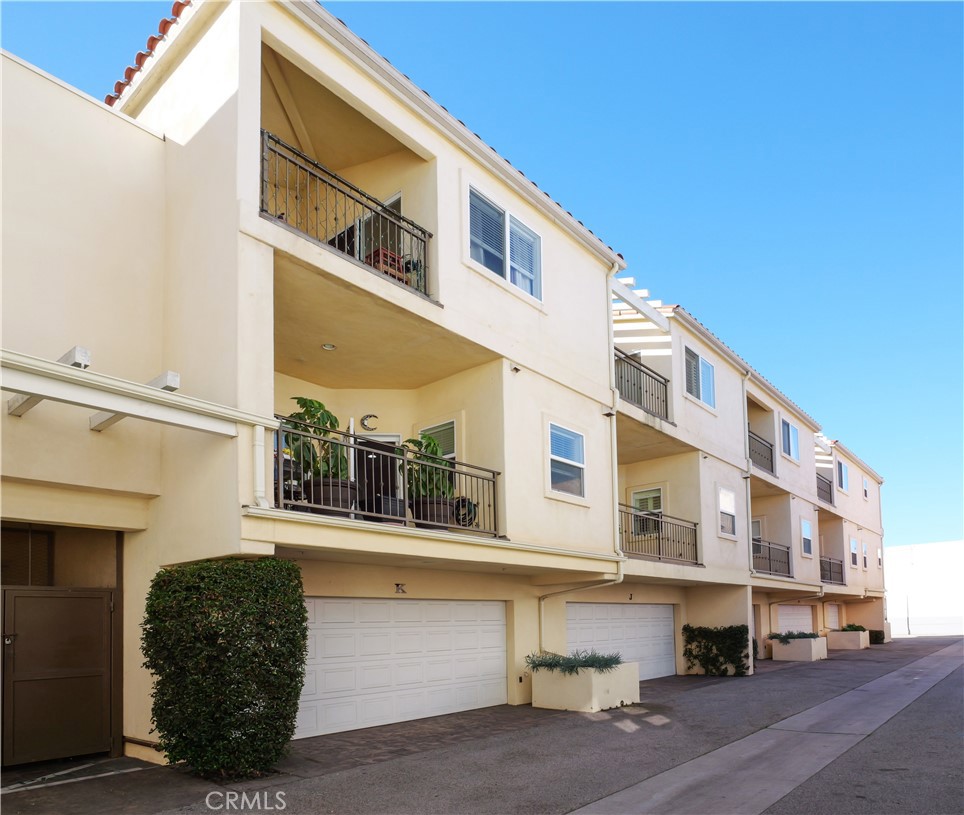 1323 Post Avenue, Unit K Torrance, CA 90501 - Photo 22 of 23 a front view of a building with street