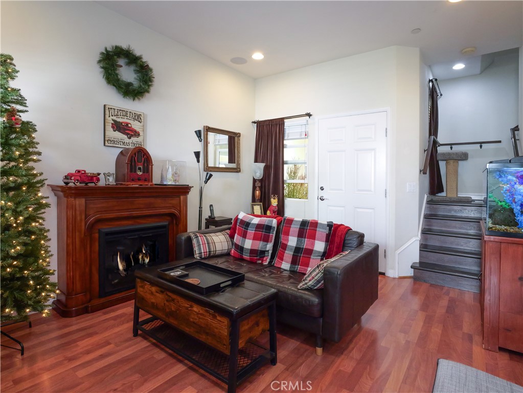 1323 Post Avenue, Unit K Torrance, CA 90501 - Photo 3 of 23 a living room with furniture and a fireplace