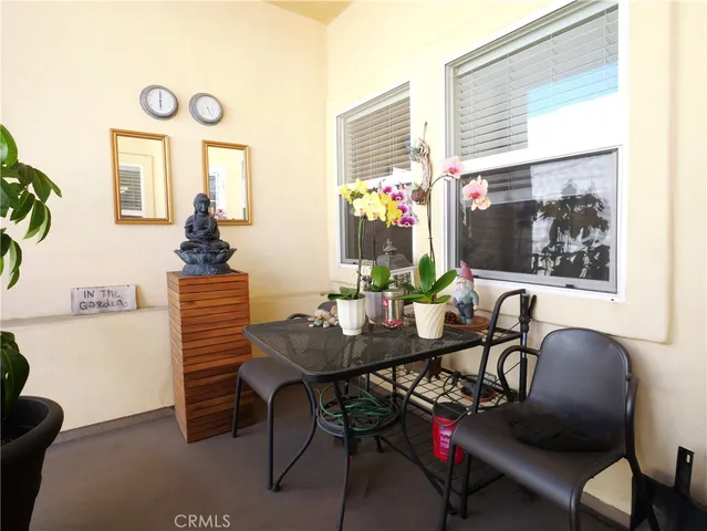 a view of a livingroom with furniture and window