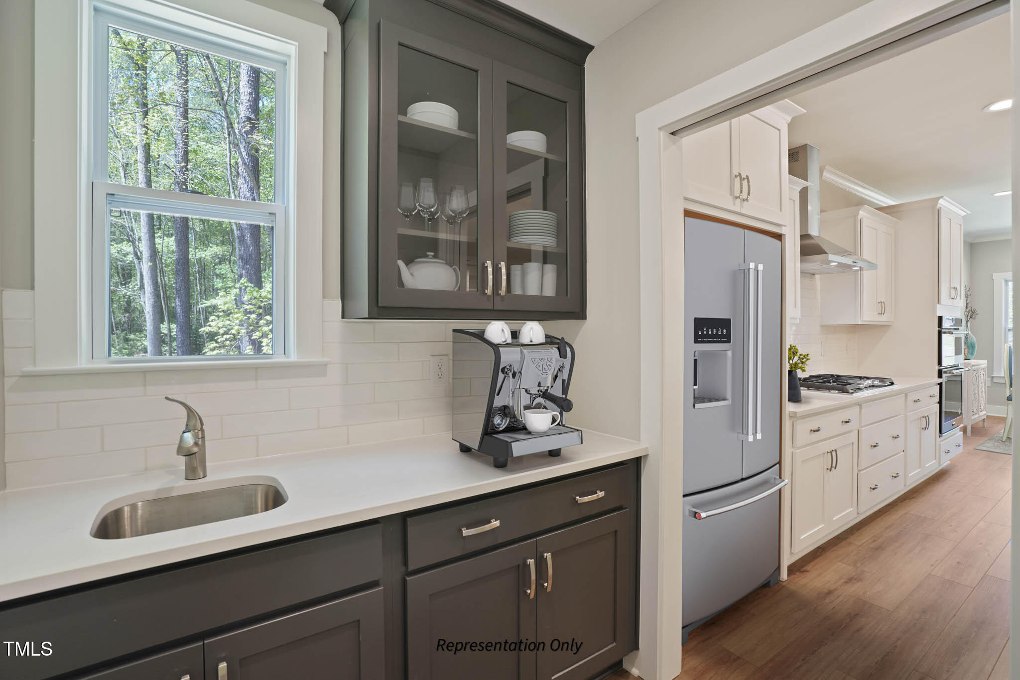 134 Merle Way Zebulon, NC 27597 - Photo 12 of 48 a kitchen with stainless steel appliances a sink stove and refrigerator