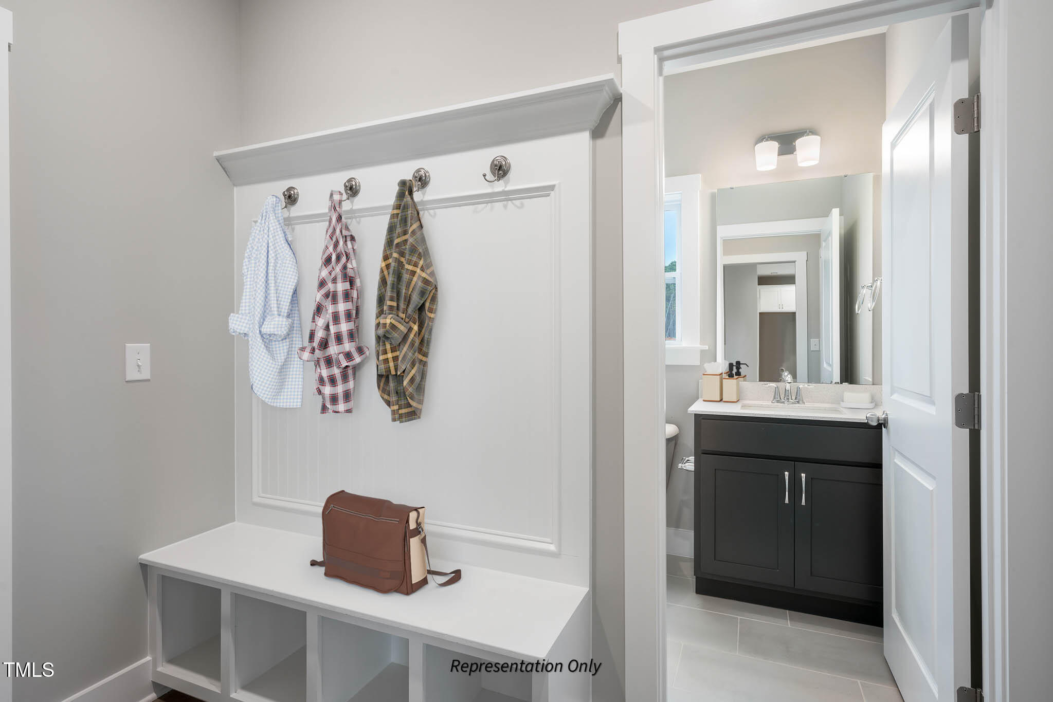 134 Merle Way Zebulon, NC 27597 - Photo 16 of 48 a bathroom with a sink and a mirror
