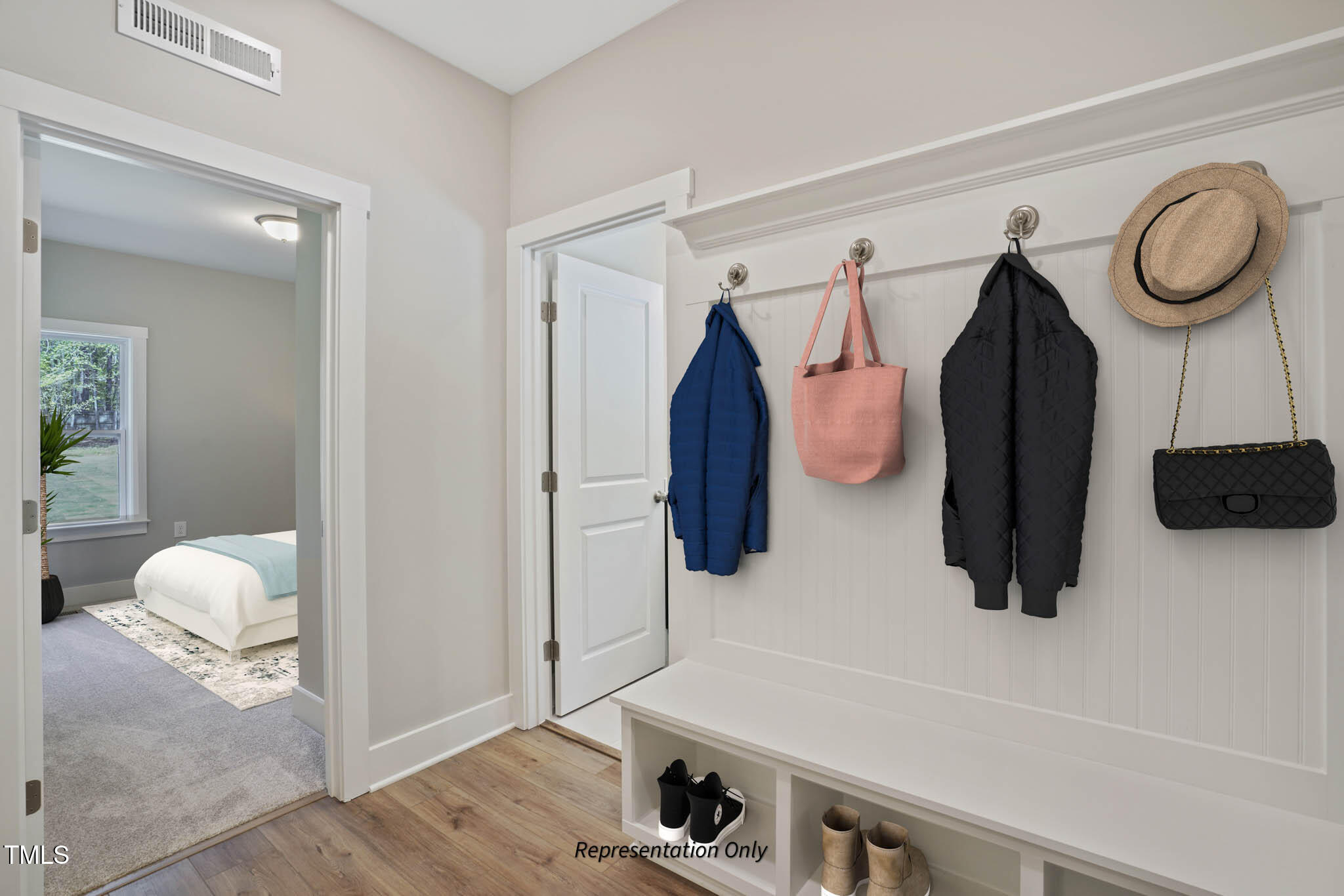 134 Merle Way Zebulon, NC 27597 - Photo 18 of 48 a view of walk in closet with clothes and shoes