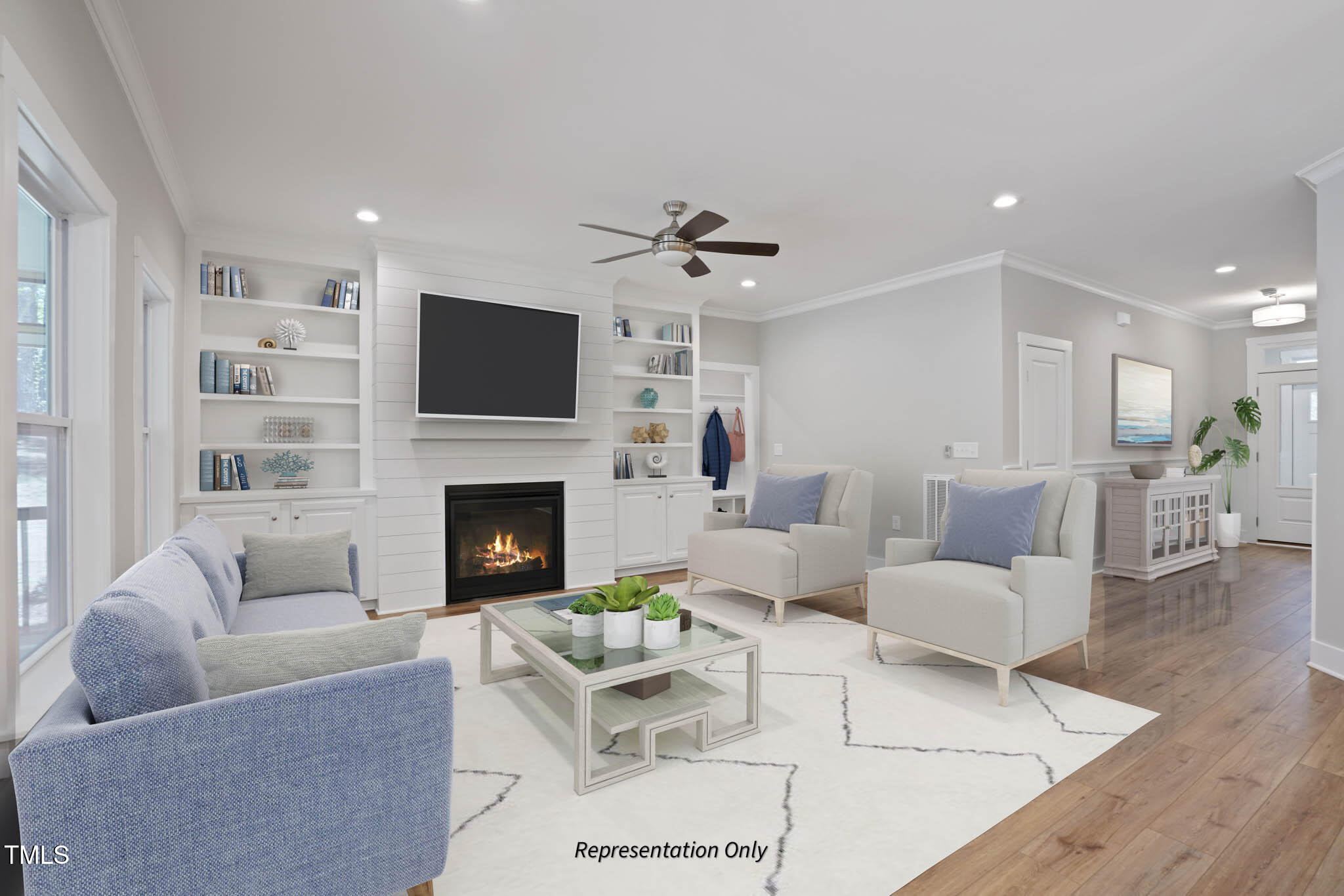 134 Merle Way Zebulon, NC 27597 - Photo 22 of 48 a living room with furniture a flat screen tv and a fireplace