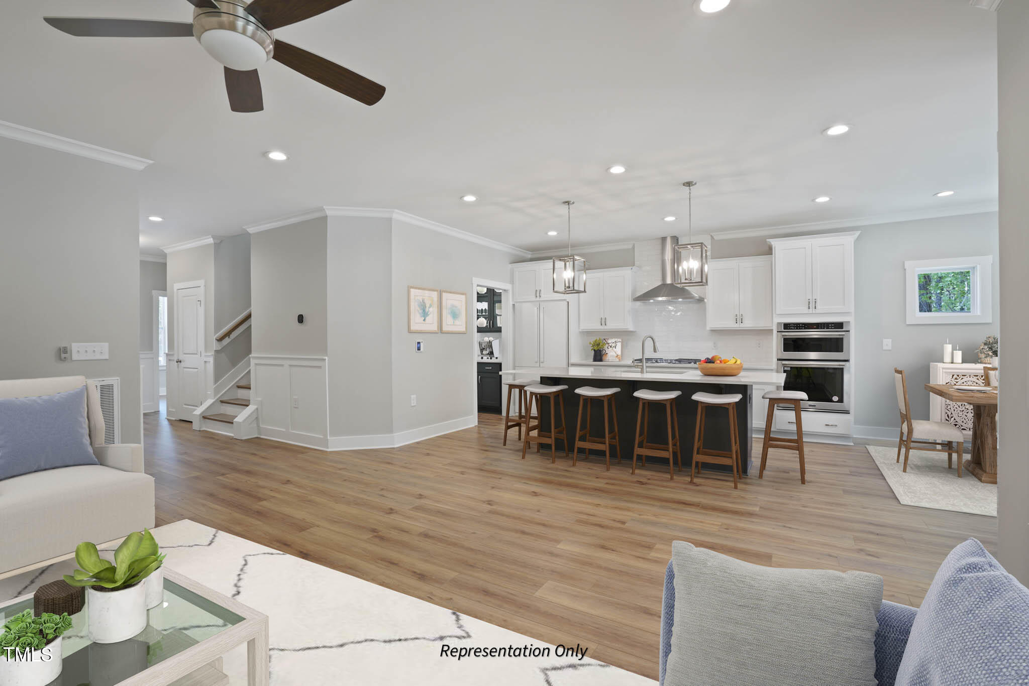 134 Merle Way Zebulon, NC 27597 - Photo 25 of 48 a living room with stainless steel appliances furniture and a kitchen view