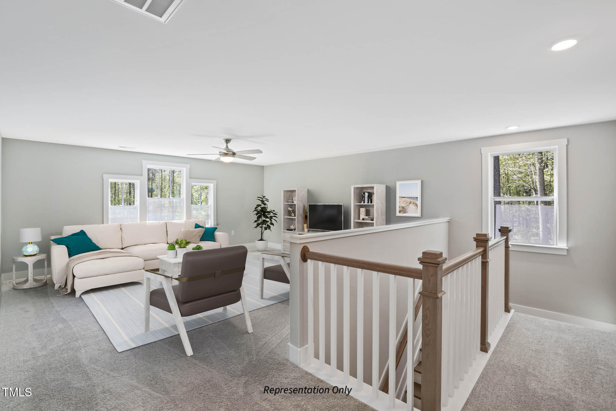 134 Merle Way Zebulon, NC 27597 - Photo 28 of 48 a living room with furniture and a table
