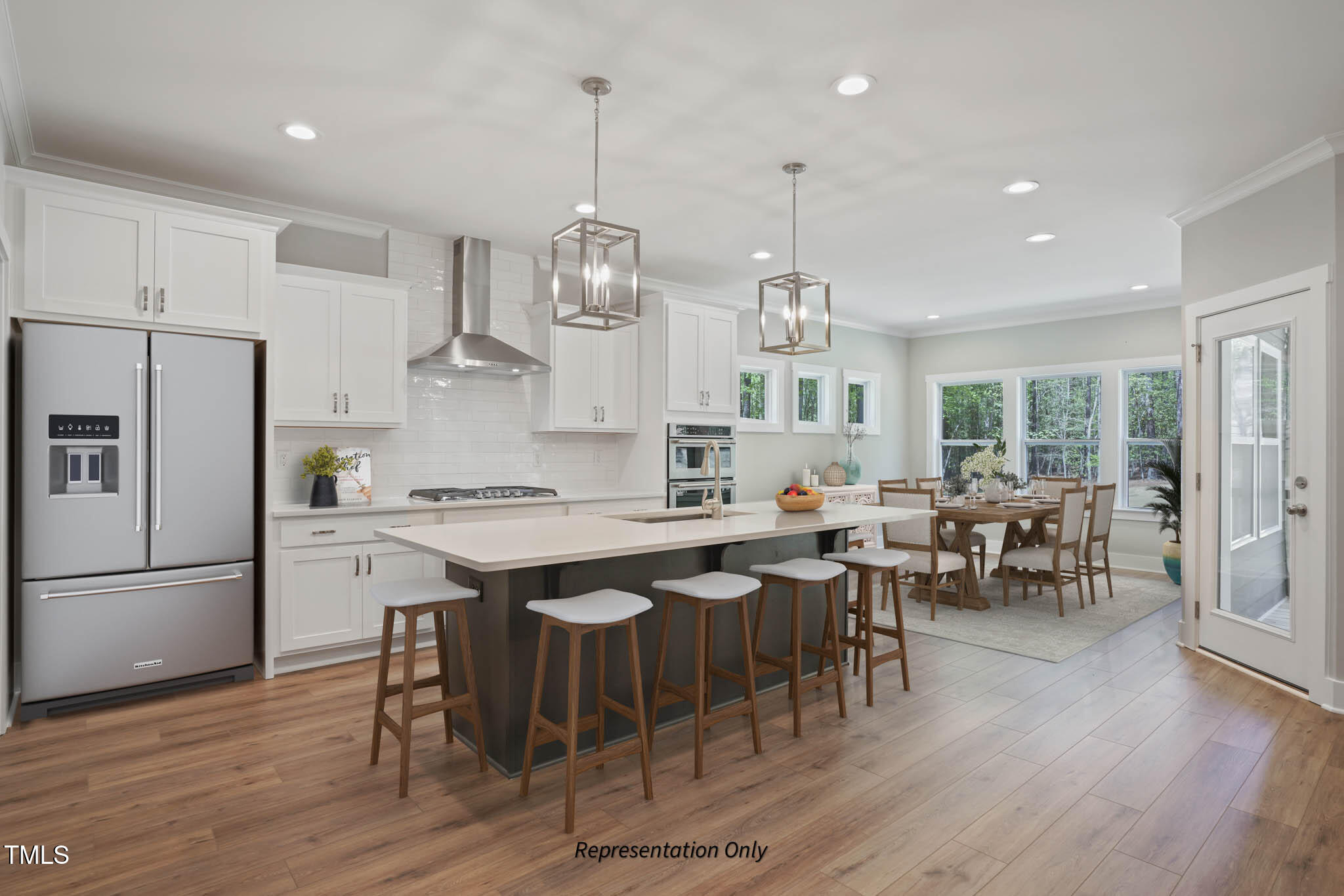 134 Merle Way Zebulon, NC 27597 - Photo 8 of 48 a large kitchen with a table and chairs