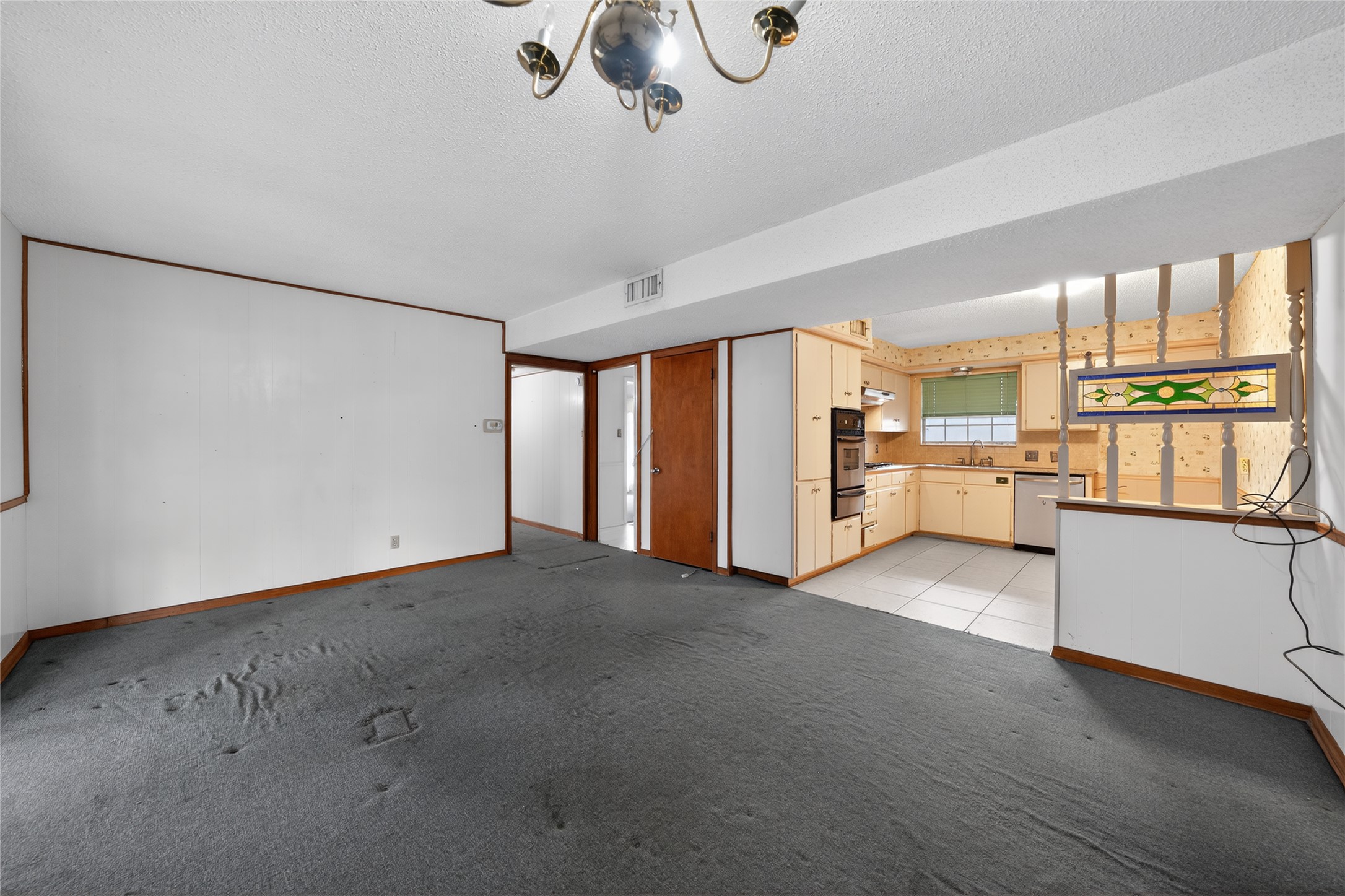 2112 Vanderbilt Lane Austin, TX 78723 - Photo 7 of 23 a view of an empty room with a window