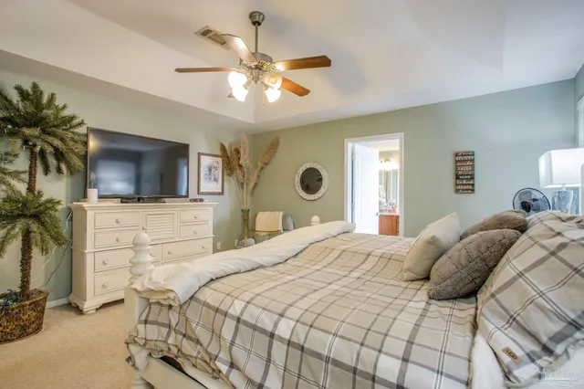 a bathroom with a tub sink and a mirror