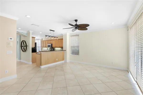 a view of a kitchen with a sink and a window