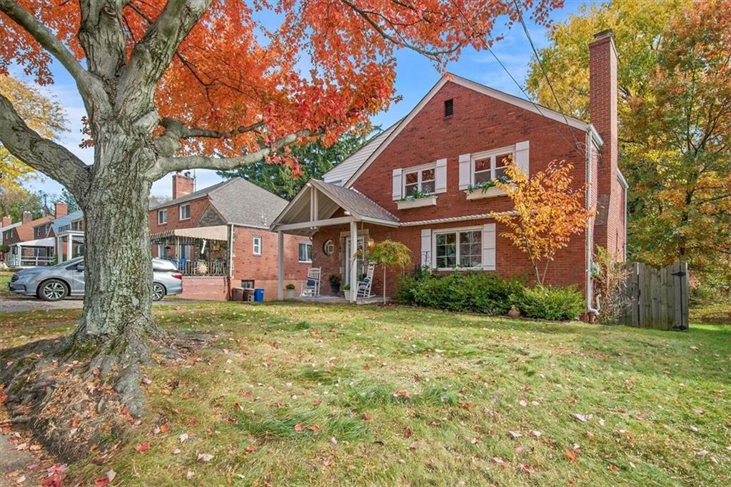 4340 Stanton Avenue Pittsburgh, PA 15201 - Photo 1 of 25 a front view of a house with a yard