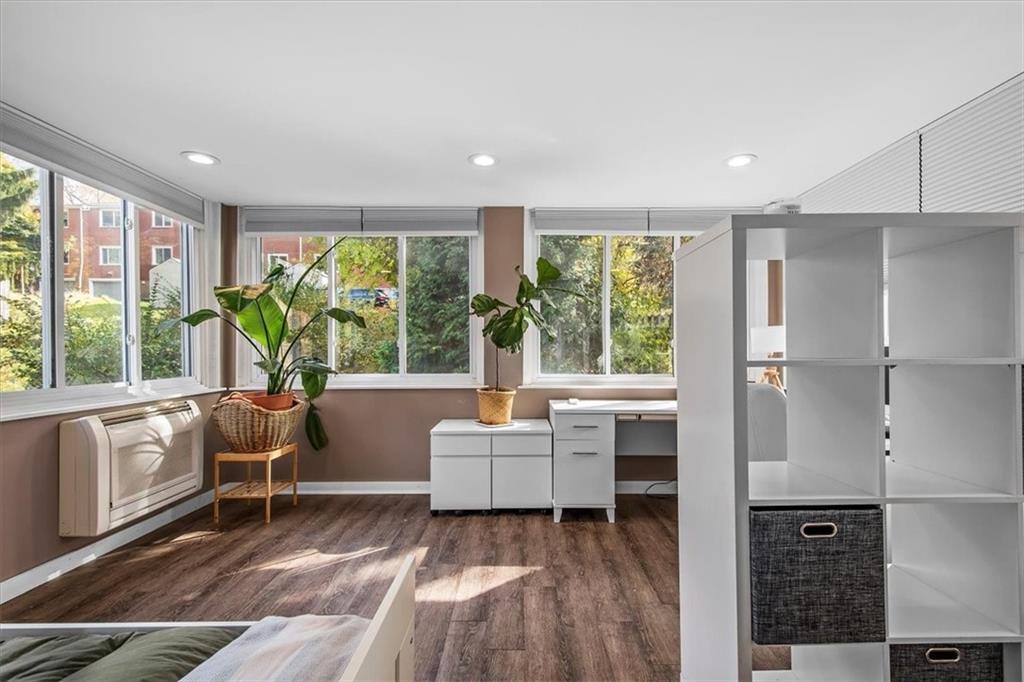4340 Stanton Avenue Pittsburgh, PA 15201 - Photo 15 of 25 a living room with furniture and large windows