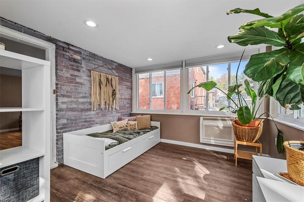 4340 Stanton Avenue Pittsburgh, PA 15201 - Photo 17 of 25 a living room with furniture and a potted plant