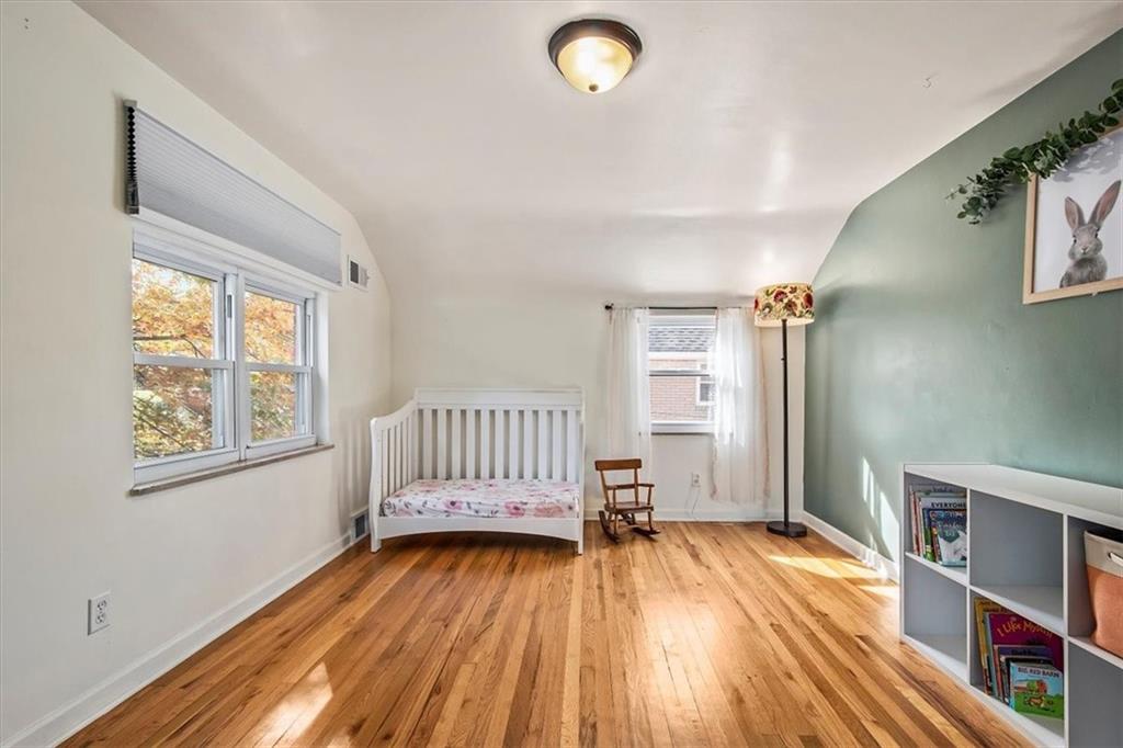 4340 Stanton Avenue Pittsburgh, PA 15201 - Photo 21 of 25 a view of livingroom with furniture and wooden floor