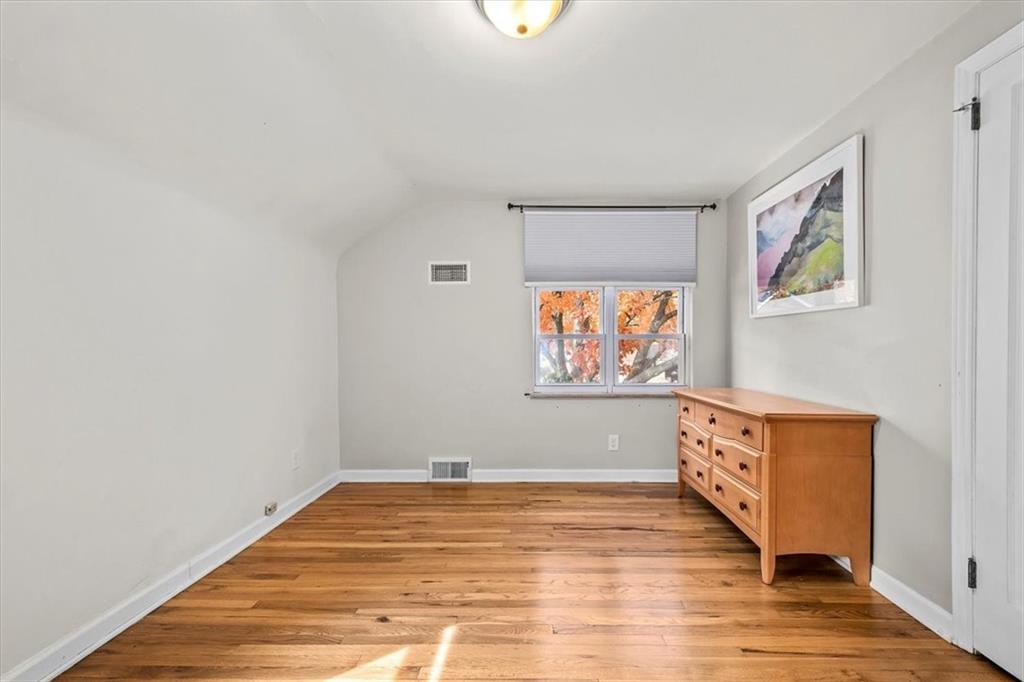 4340 Stanton Avenue Pittsburgh, PA 15201 - Photo 22 of 25 a view of a room with wooden floor and window