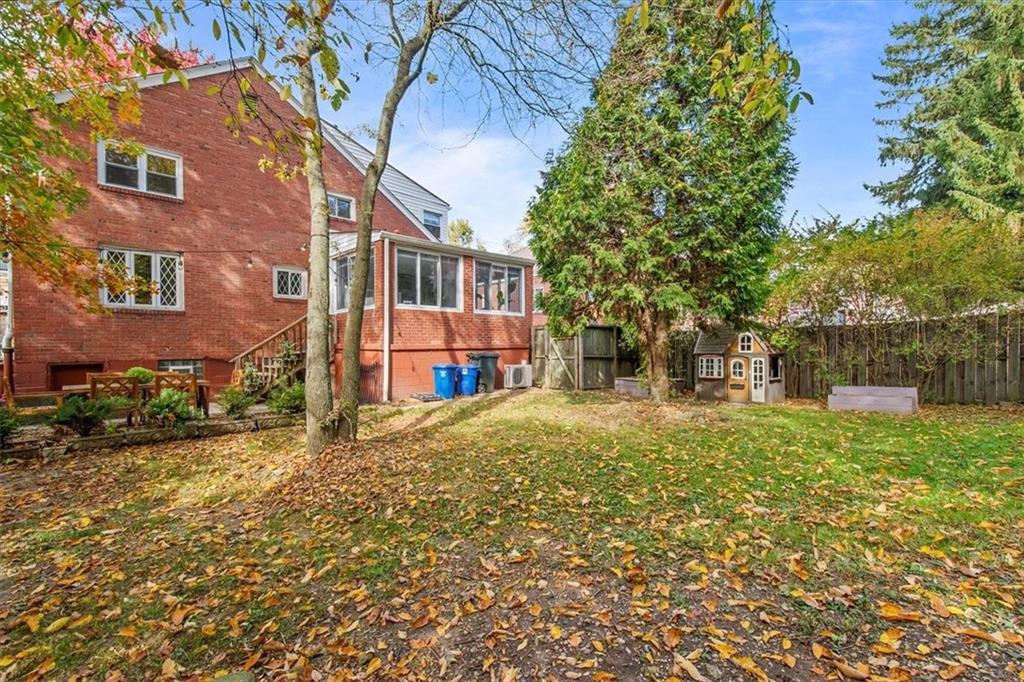4340 Stanton Avenue Pittsburgh, PA 15201 - Photo 24 of 25 a backyard of a house with lots of green space