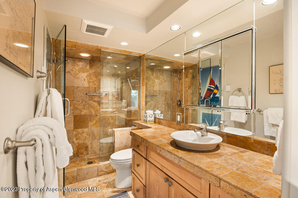 39060 Highway 82, Unit 7 Aspen, CO 81611 - Photo 12 of 17 a bathroom with a sink double vanity and a mirror