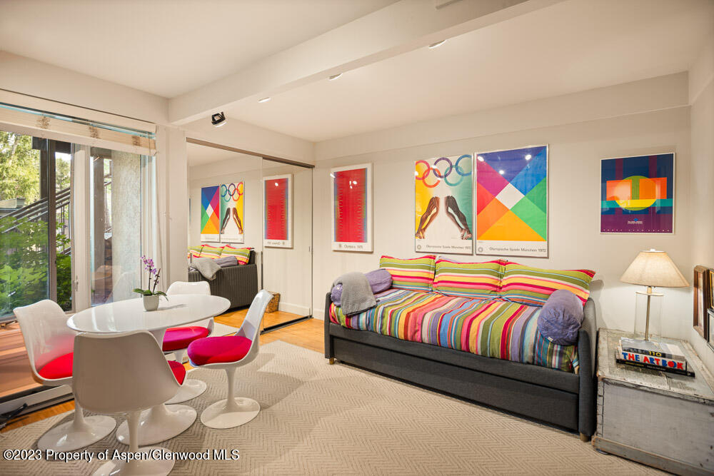 39060 Highway 82, Unit 7 Aspen, CO 81611 - Photo 14 of 17 a bedroom with a bed and window