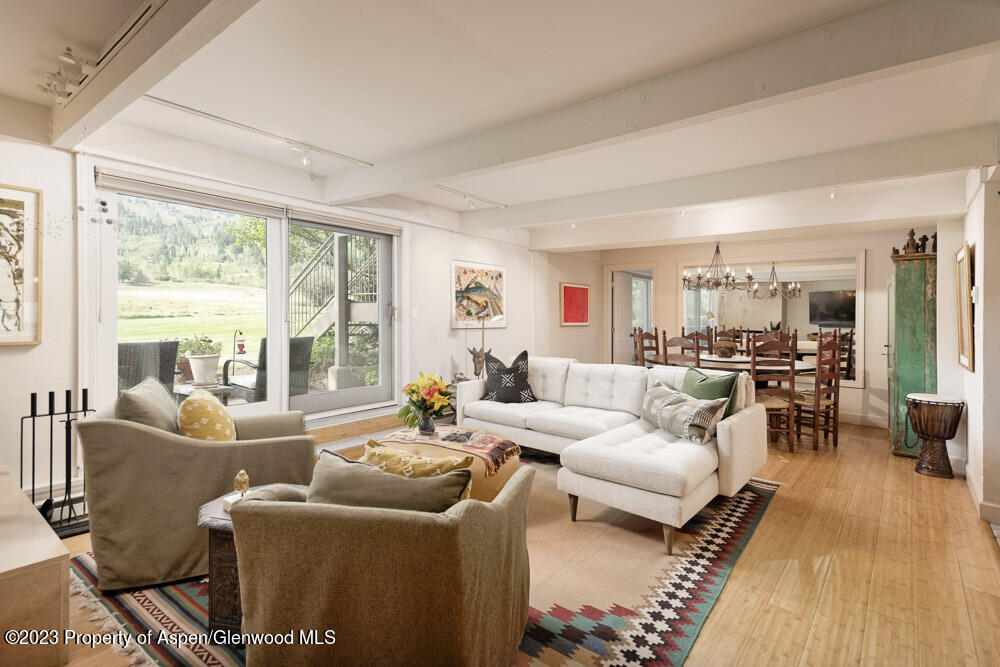 39060 Highway 82, Unit 7 Aspen, CO 81611 - Photo 4 of 17 a living room with furniture and a table