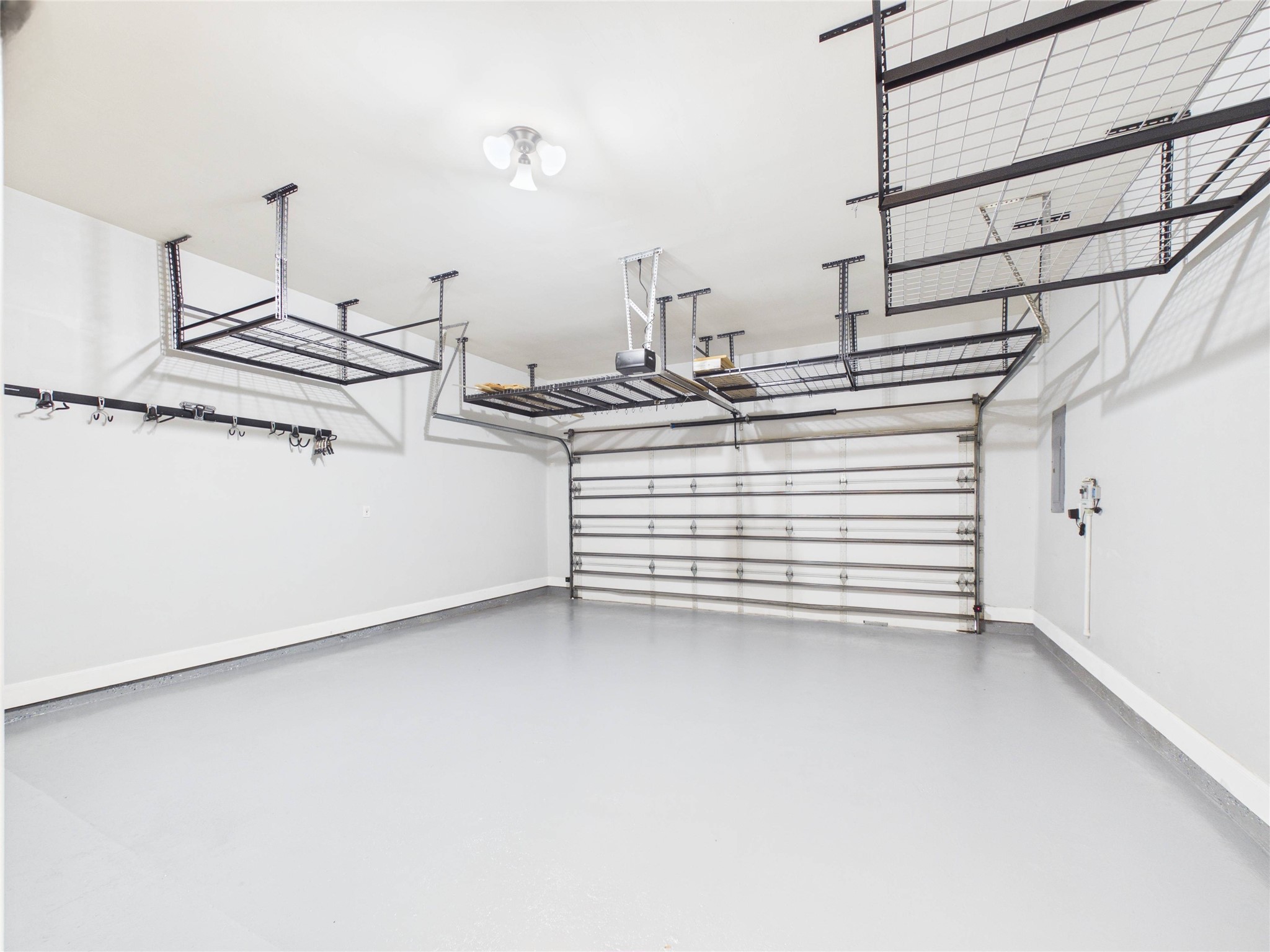 403 Harborside Way Kemah, TX 77565 - Photo 9 of 39 Two car garage has insulated door and extra storage