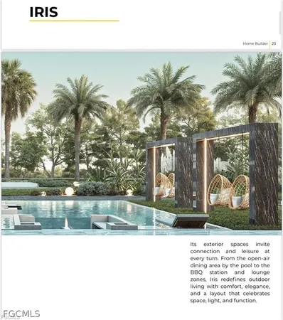 a view of a swimming pool with an outdoor seating