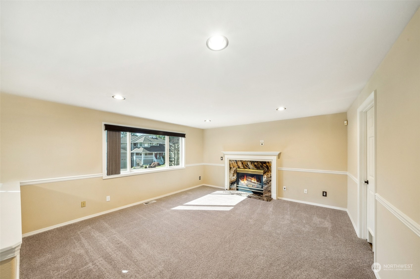 4609 Southwest 328th Place Federal Way, WA 98023 - Photo 11 of 32 a view of a livingroom with a window and a couch