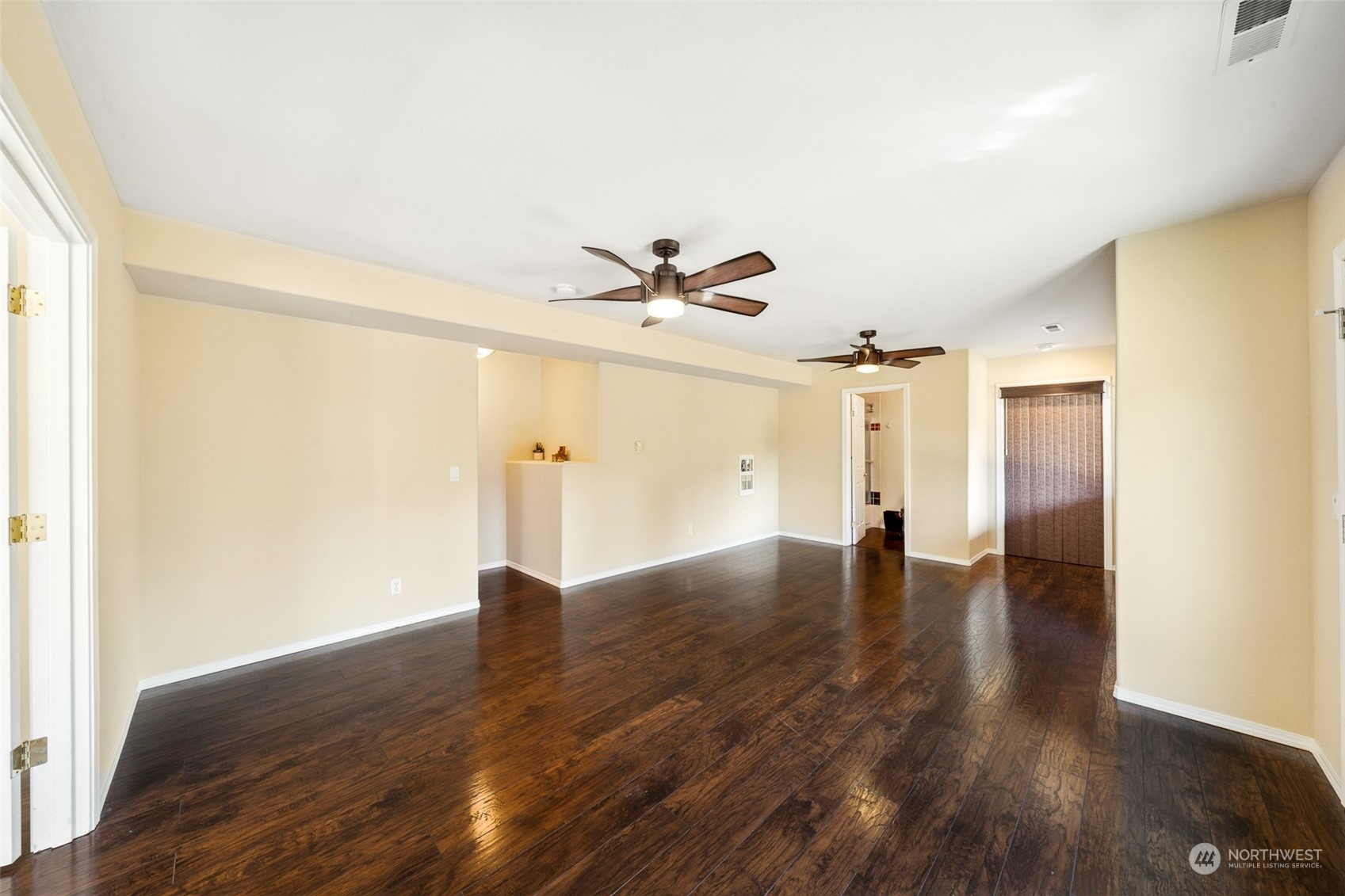 4609 Southwest 328th Place Federal Way, WA 98023 - Photo 16 of 32 a view of a livingroom with wooden floor