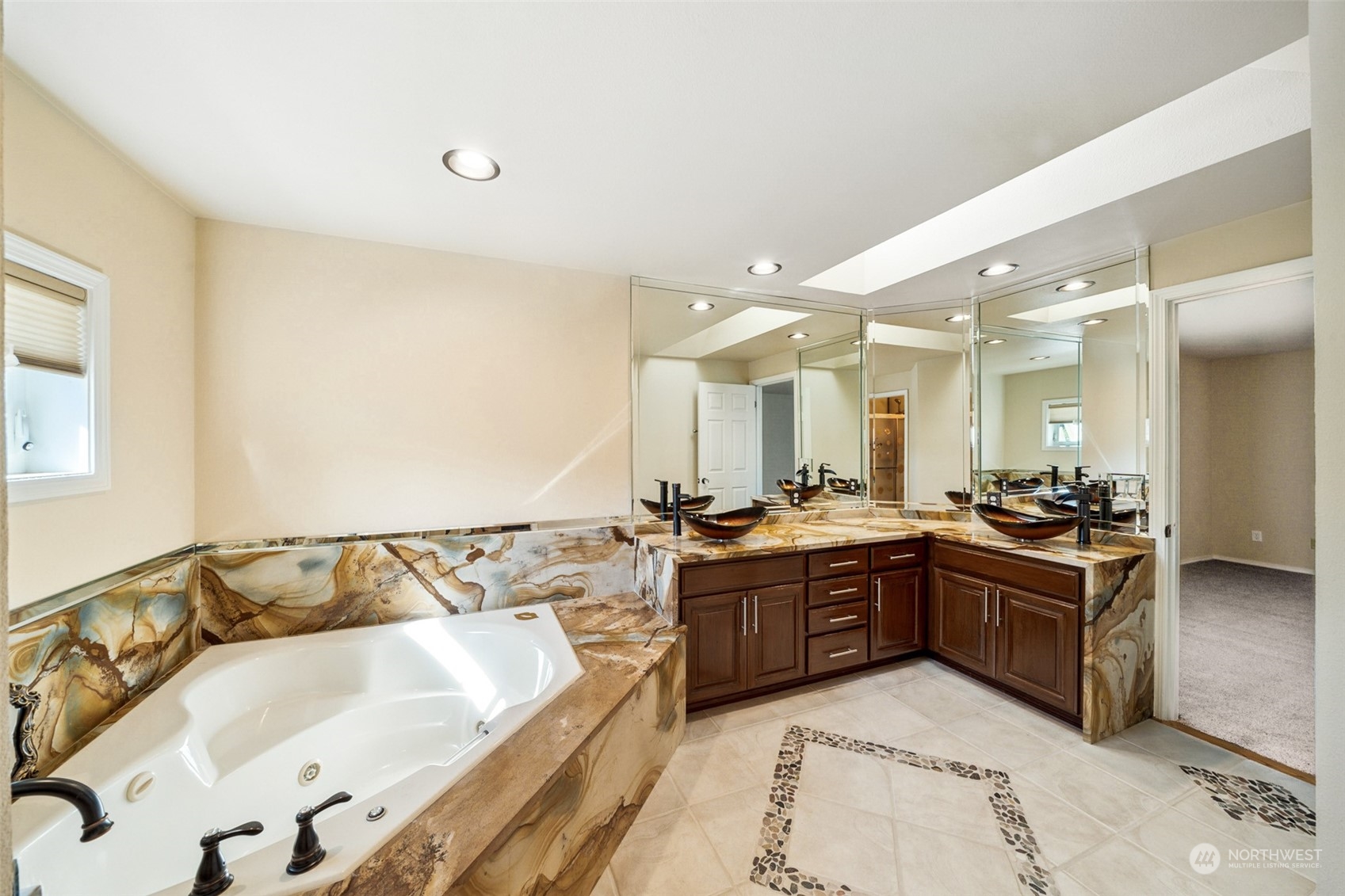 4609 Southwest 328th Place Federal Way, WA 98023 - Photo 25 of 32 a large bathroom with a large tub and sink