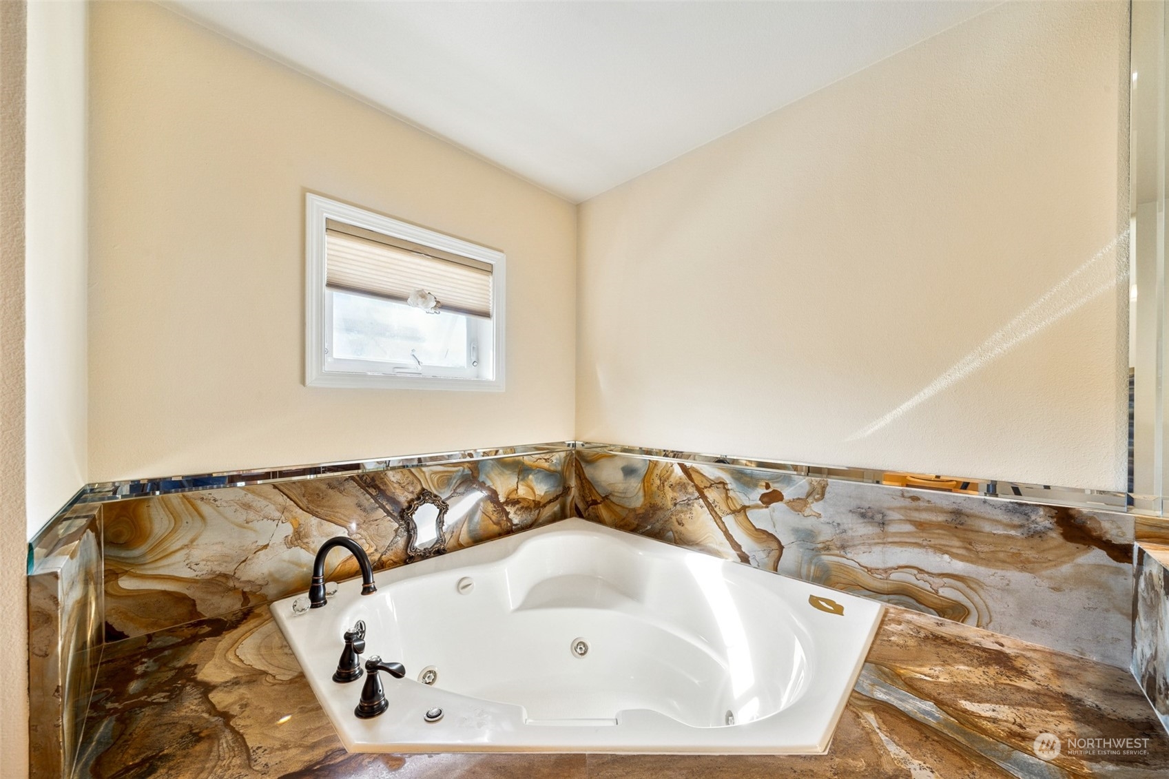 4609 Southwest 328th Place Federal Way, WA 98023 - Photo 26 of 32 a bath tub sitting in a bathroom next to a window