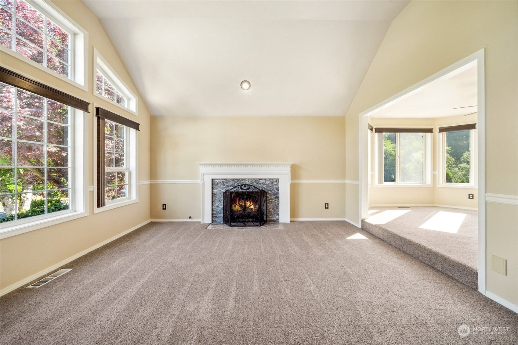 4609 Southwest 328th Place Federal Way, WA 98023 - Photo 4 of 32 an empty room with windows and fireplace