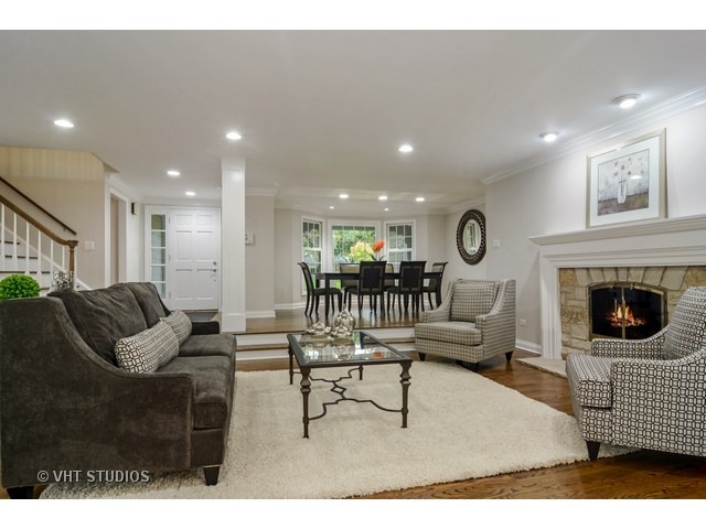820 North Inverway Road Inverness, IL 60067 - Photo 2 of 25 a living room with furniture and a fireplace