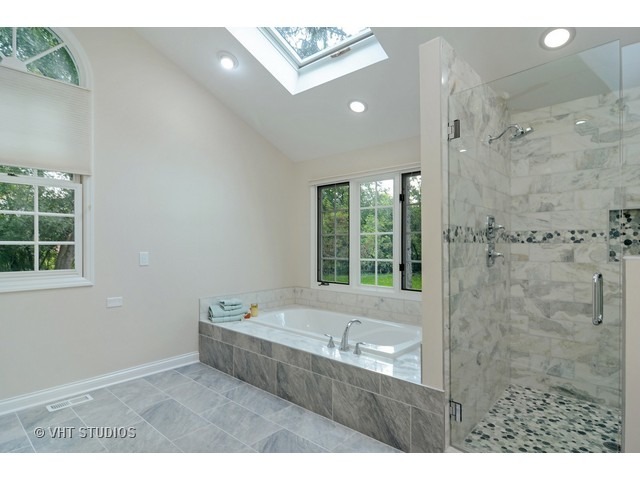 820 North Inverway Road Inverness, IL 60067 - Photo 15 of 25 a bathroom with a granite countertop sink a toilet and shower