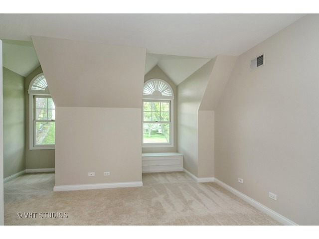 820 North Inverway Road Inverness, IL 60067 - Photo 19 of 25 a view of empty room with wooden floor and fan