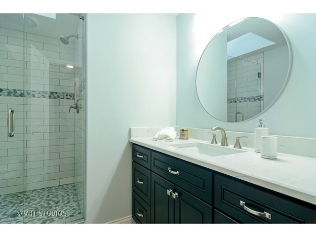 820 North Inverway Road Inverness, IL 60067 - Photo 21 of 25 a bathroom with a double vanity sink mirror and shower